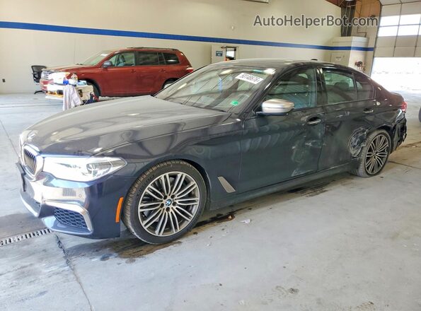 WBAJB9C56JB049765 2018 BMW M5 Black Առջևի ձախ երեք քառորդ տեսարան