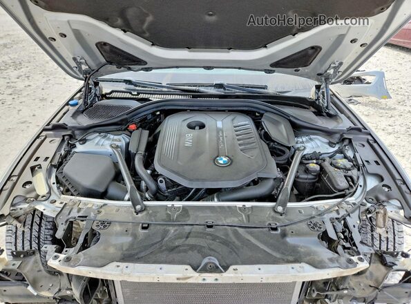 WBAJE7C38HG890980 2017 BMW OTHER Серебряный Вид задней части салона