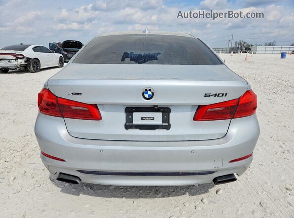 WBAJE7C38HG890980 2017 BMW OTHER Серебряный Вид сзади