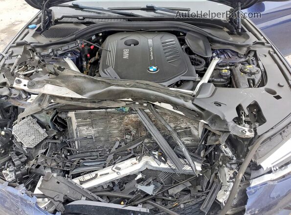 WBAJE7C58KWW14586 2019 BMW 5 SERIES Синий Вид задней части салона