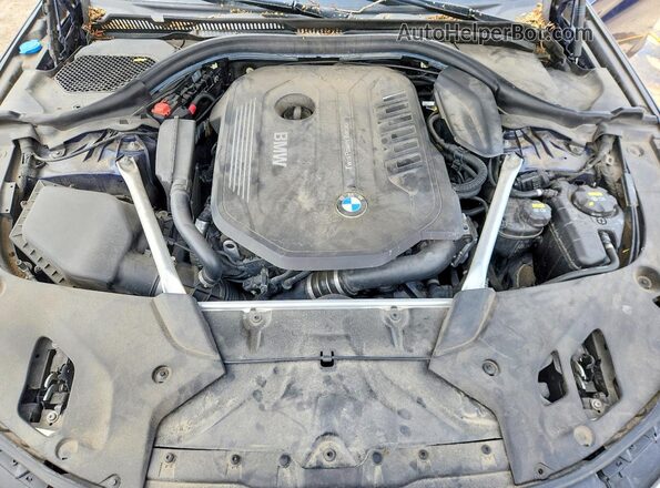 WBAJE7C59KWW13270 2019 BMW OTHER Blue Widok wnętrza z tyłu