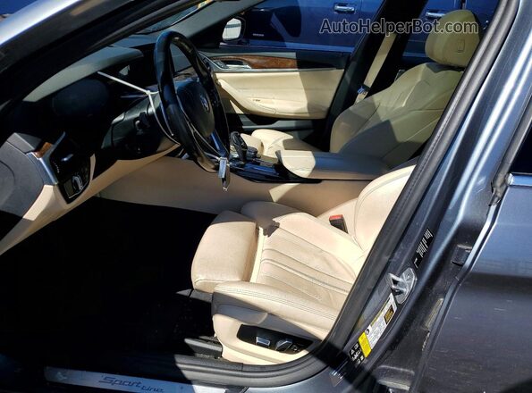 WBAJR7C04LWW68543 2020 BMW 5 SERIES Бирюзовый Вид салона спереди