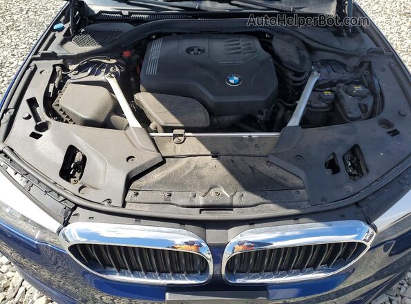 WBAJR7C07LCD65602 2020 BMW 5 SERIES Синий Вид задней части салона
