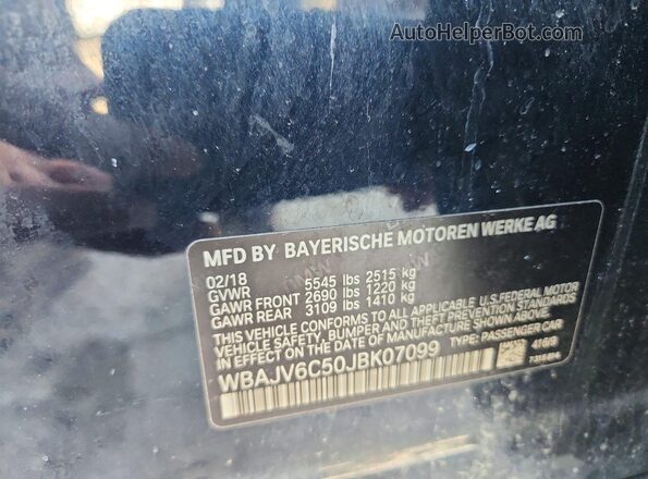 WBAJV6C50JBK07099 2018 BMW OTHER Black Vista del compartimento del motor