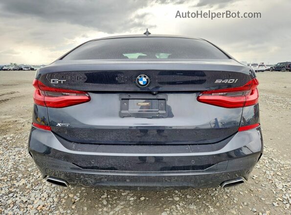 WBAJV6C55JBJ99775 2018 BMW OTHER Серый Вид сзади