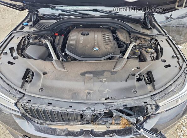 WBAJV6C55JBJ99775 2018 BMW OTHER Серый Вид задней части салона