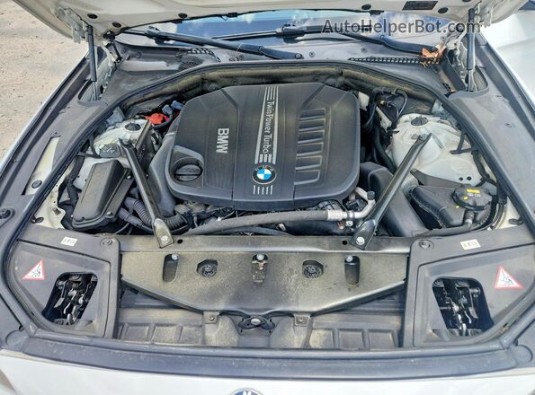WBAXA5C5XGD691876 2016 BMW 5 SERIES Белый Вид задней части салона