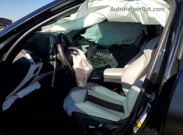 WBS43AY05PFP72772 2023 BMW M3 Black Widok wnętrza z przodu