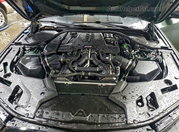WBS83CH09PCL44962 2023 BMW M5 Green Vista interior trasera