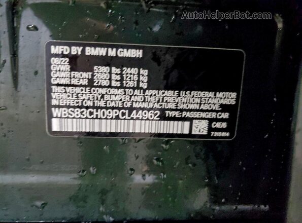 WBS83CH09PCL44962 2023 BMW M5 Green Vista del compartimento del motor