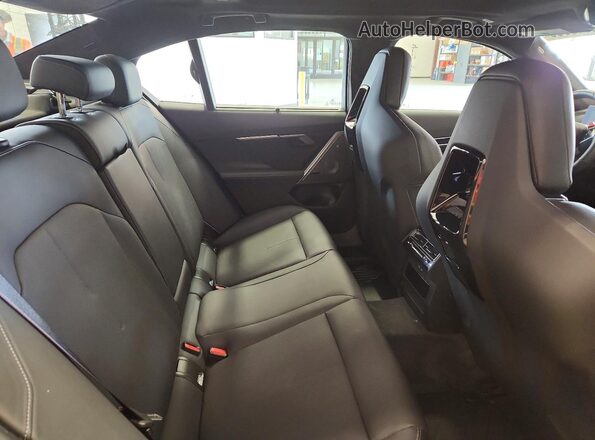 WBS83FK05TCV11581 2026 BMW M5 Black Vista de los asientos traseros