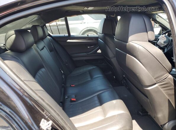 WBSFV9C52GD595744 2016 BMW M5 Blue Vista de los asientos traseros