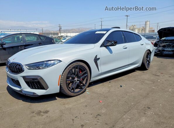 WBSGV0C03PCL80271 2023 BMW M8 Gray Առջևի ձախ երեք քառորդ տեսարան