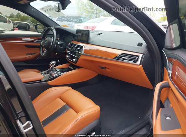 WBSJF0C5XJB282835 2018 BMW M5 Black Vista interior delantera