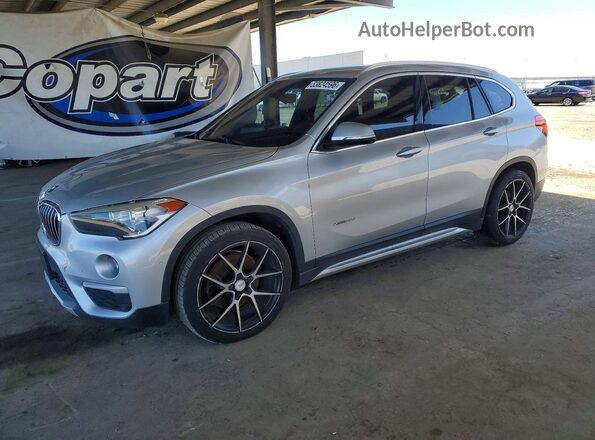 WBXHT3C30G5E56309 2016 BMW X1 Silver Przód lewy