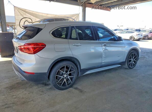 WBXHT3C30G5E56309 2016 BMW X1 Silver Tył prawy