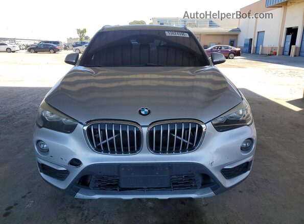 WBXHT3C30G5E56309 2016 BMW X1 Silver Widok z przodu