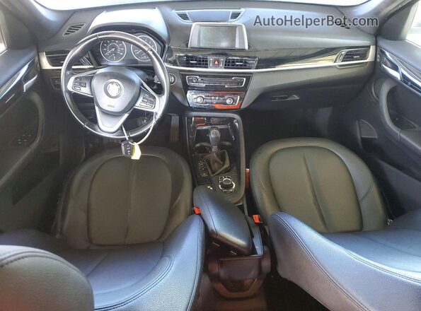 WBXHT3C30G5E56309 2016 BMW X1 Silver Widok deski rozdzielczej