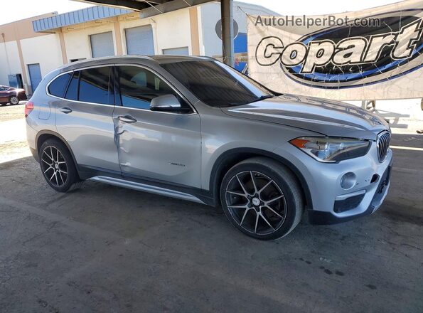 WBXHT3C30G5E56309 2016 BMW X1 Silver Przód prawy