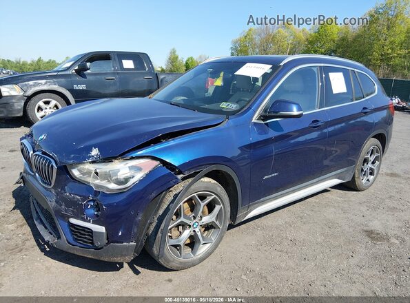 WBXHT3C30GP883264 2016 BMW X1 Blue Передня ліва чверть