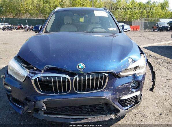 WBXHT3C30GP883264 2016 BMW X1 Blue Вид спереду