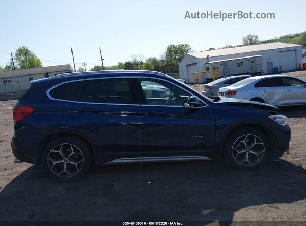 WBXHT3C30GP883264 2016 BMW X1 Blue Вид задньої частини салону