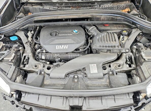 WBXHT3C30H5F86009 2017 BMW X1 Black Вид підкапотного простору