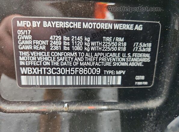 WBXHT3C30H5F86009 2017 BMW X1 Black Вид наклейки з VIN-кодом