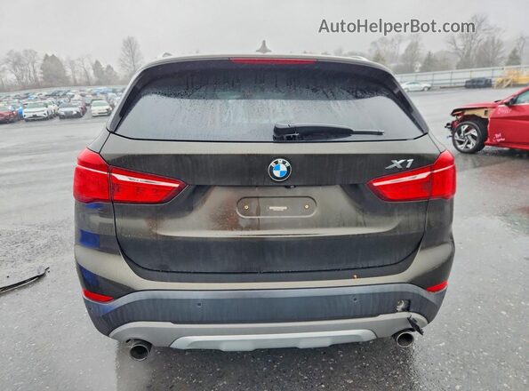 WBXHT3C30H5F86009 2017 BMW X1 Black Вид ззаду