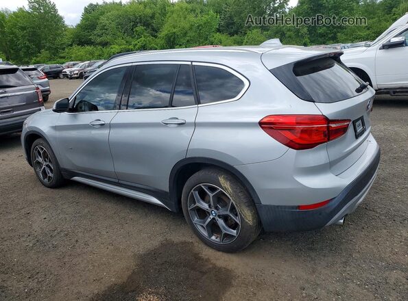WBXHT3C31GP886321 2016 BMW X1 Серебряный Задняя левая четверть