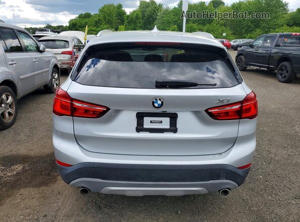 WBXHT3C31GP886321 2016 BMW X1 Серебряный Вид сзади