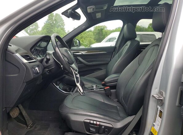 WBXHT3C31GP886321 2016 BMW X1 Серебряный Вид салона спереди