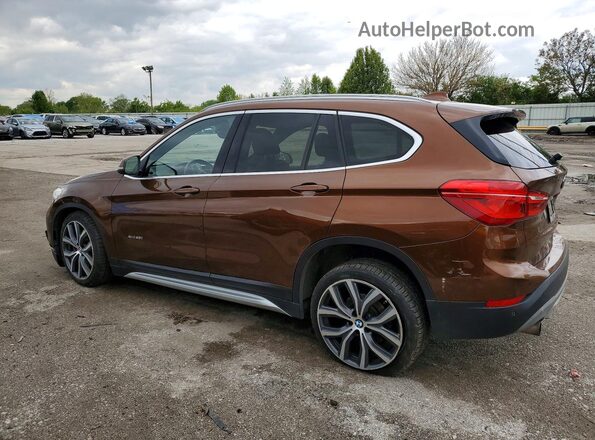WBXHT3C31H5F67758 2017 BMW X1 Коричневый Задняя левая четверть