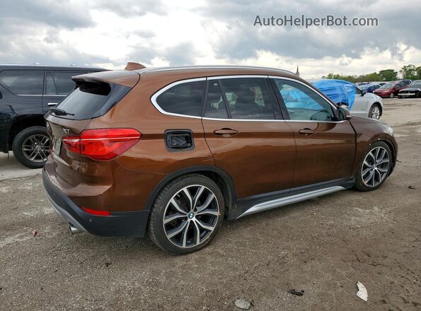 WBXHT3C31H5F67758 2017 BMW X1 Коричневый Задняя правая четверть