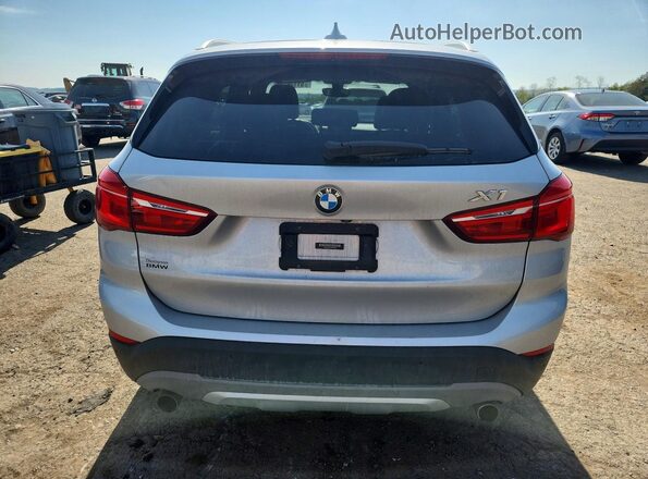 WBXHT3C31H5F72040 2017 BMW X1 Silver Widok z tyłu