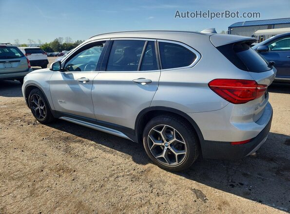 WBXHT3C31H5F72040 2017 BMW X1 Silver Tył lewy
