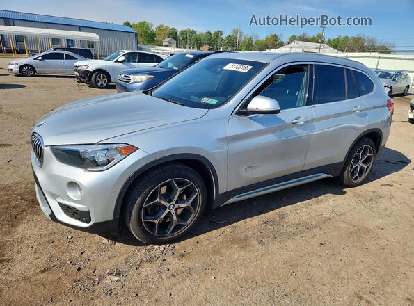 WBXHT3C31H5F72040 2017 BMW X1 Silver Przód lewy