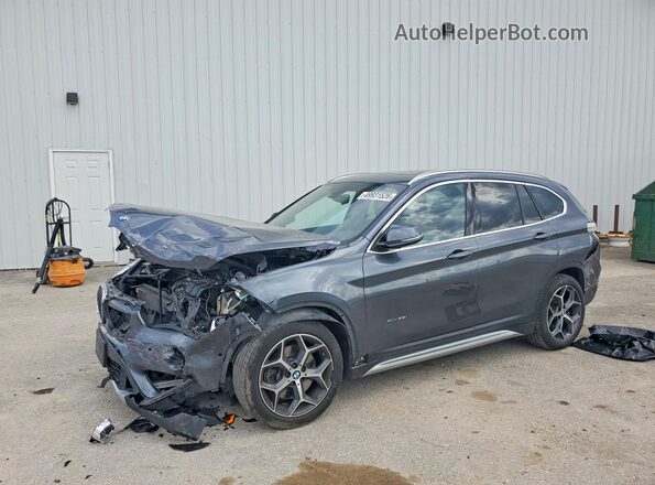 WBXHT3C31H5F73737 2017 BMW X1 Black Front left