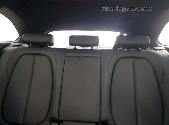 WBXHT3C31H5F73737 2017 BMW X1 Black Rear seats view