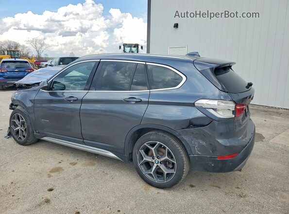 WBXHT3C31H5F73737 2017 BMW X1 Black Rear left