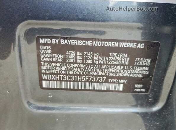 WBXHT3C31H5F73737 2017 BMW X1 Black VIN sticker view