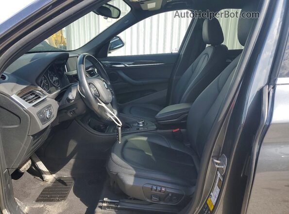 WBXHT3C31H5F73737 2017 BMW X1 Black Front interior view