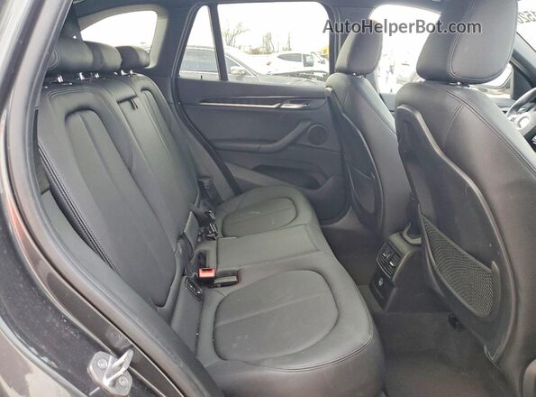 WBXHT3C31H5F73737 2017 BMW X1 Black Rear interior view