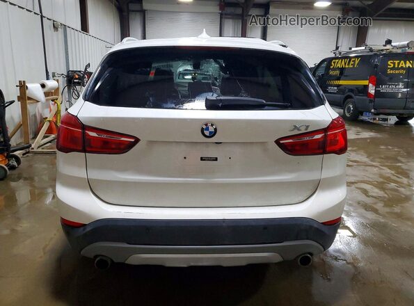 WBXHT3C31H5F83040 2017 BMW X1 White Вид ззаду
