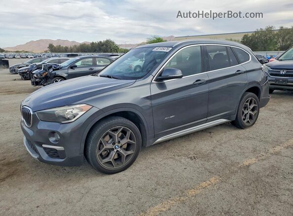 WBXHT3C31J5K26072 2018 BMW X1 Gray წინა მარცხენა ხედი სამი მეოთხედიდან