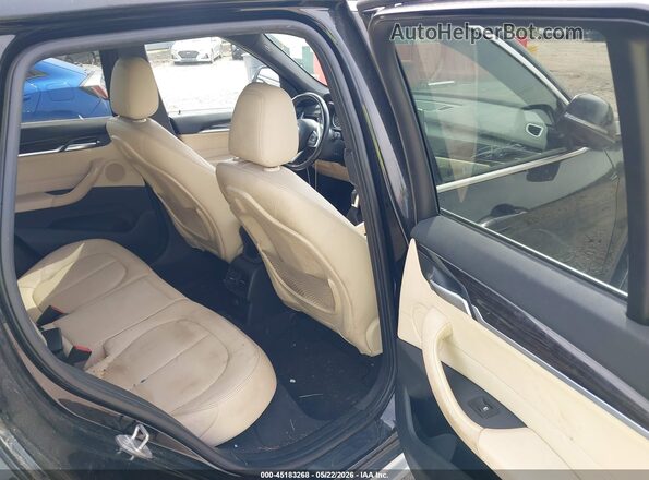 WBXHT3C32G5F63636 2016 BMW X1 Black VIN sticker view