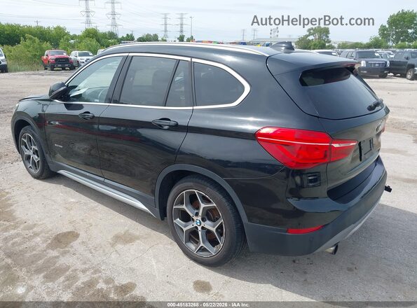WBXHT3C32G5F63636 2016 BMW X1 Black Rear left