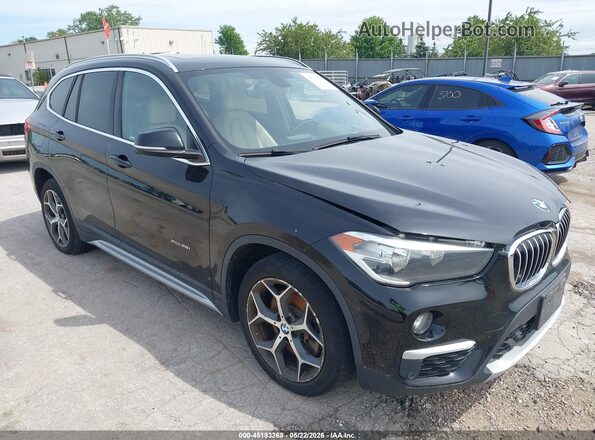 WBXHT3C32G5F63636 2016 BMW X1 Black Front right