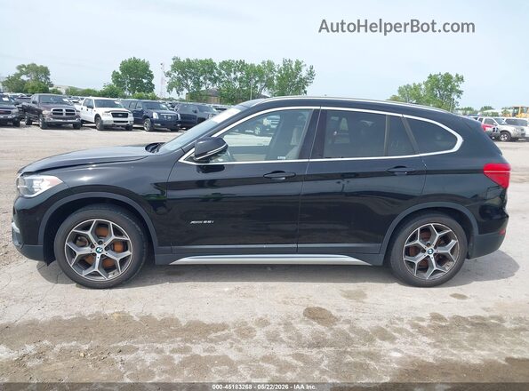WBXHT3C32G5F63636 2016 BMW X1 Black 360 interior view