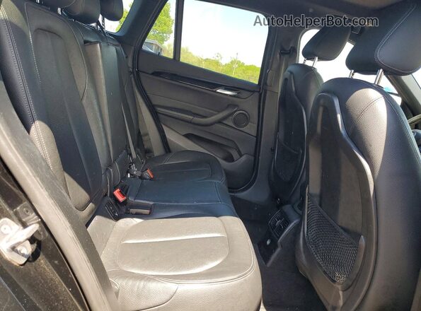 WBXHT3C32H5F72788 2017 BMW X1 Черный Вид задней части салона